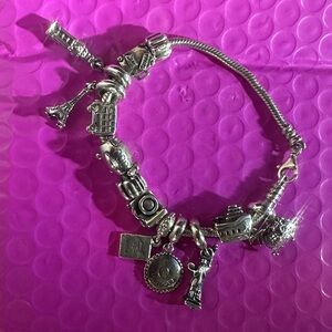 Authentic Pandora Travelers charm bracelet. It’s a must have if u travel a-lot.
